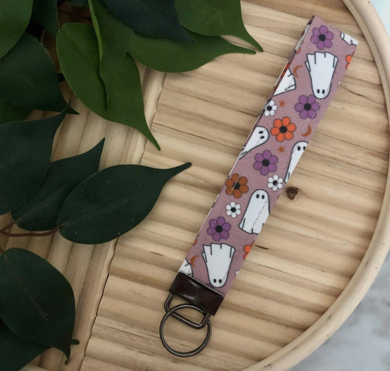 Floral ghost wristlet